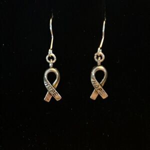 Handcrafted silver tone hope ribbon earrings.